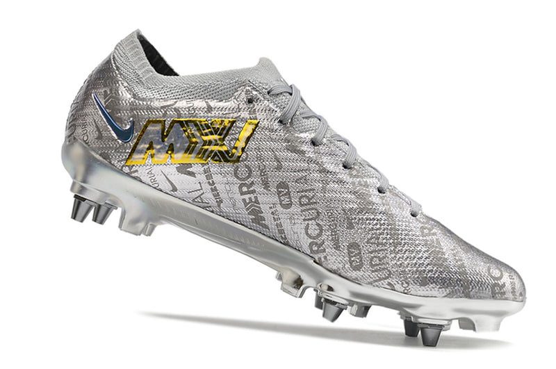 CHUTEIRA NIKE MERCURIAL VAPOR 15 TRAVA MISTA (removível)