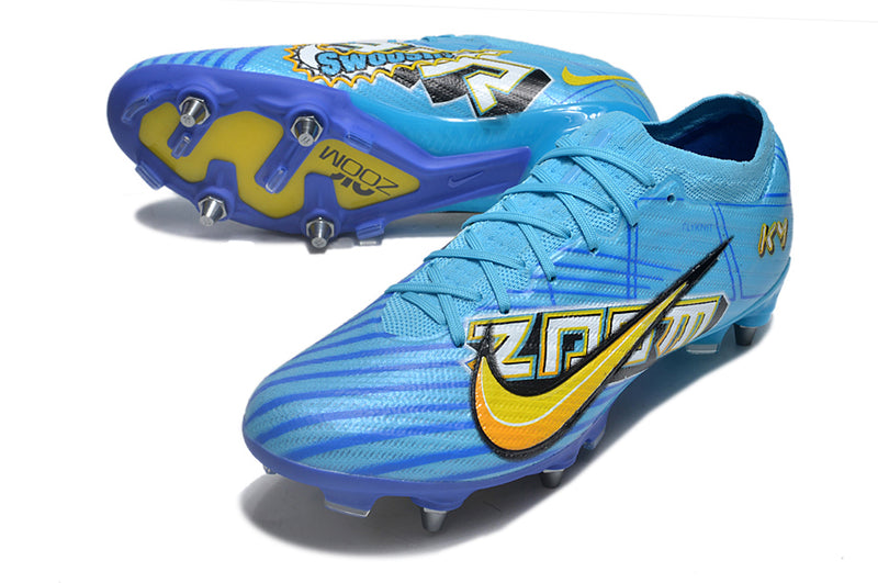 CHUTEIRA NIKE MERCURIAL VAPOR 15 TRAVA MISTA (removível)